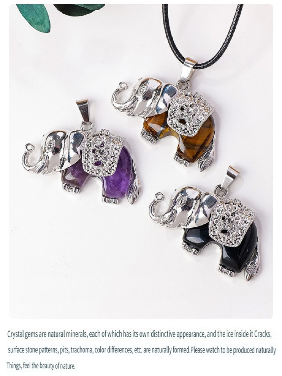 RYS Necklace with a pendant in the form of a baby elephant made of natural crystal and rough stone