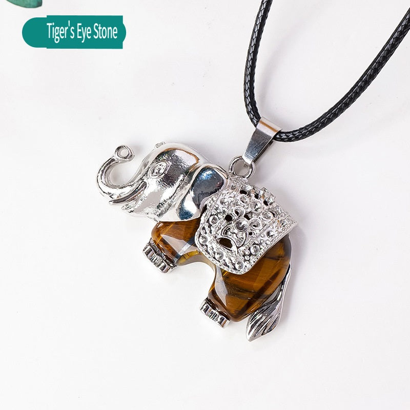 RYS Necklace with a pendant in the form of a baby elephant made of natural crystal and rough stone