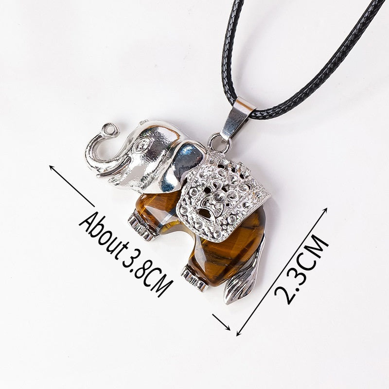 RYS Necklace with a pendant in the form of a baby elephant made of natural crystal and rough stone
