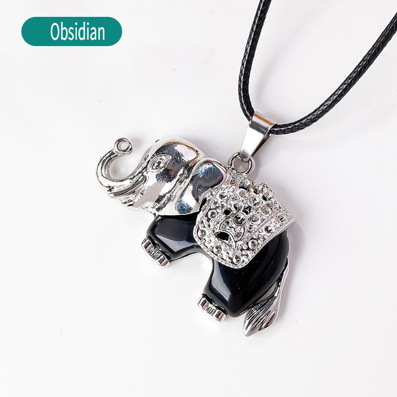 RYS Necklace with a pendant in the form of a baby elephant made of natural crystal and rough stone