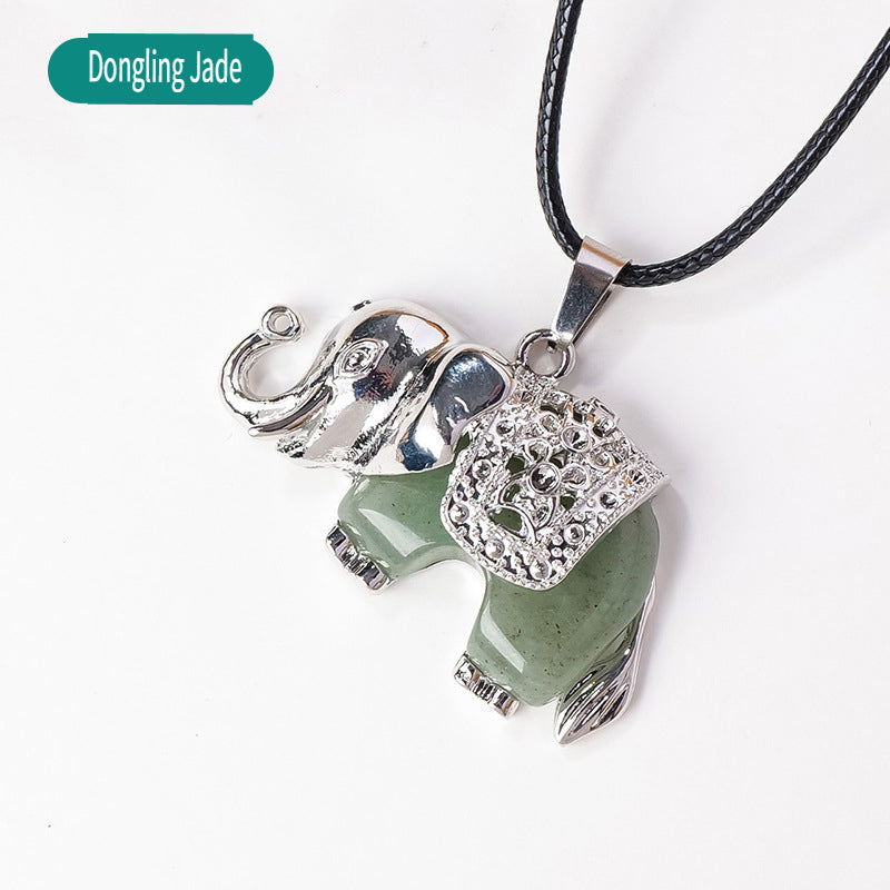 RYS Necklace with a pendant in the form of a baby elephant made of natural crystal and rough stone